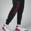 Air Jordan Essentials Holiday Sweatpants 'Black Red'4